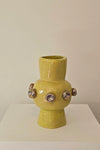 Buttons on Yellow Vase