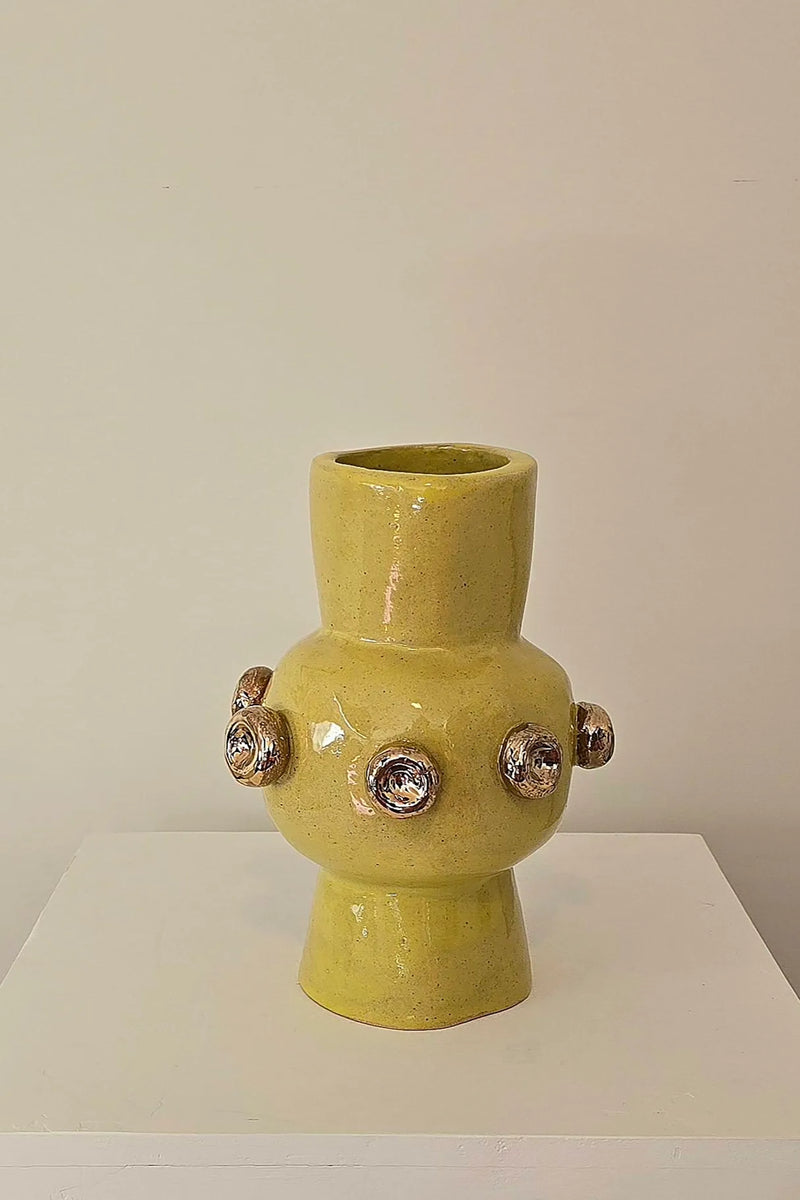 Buttons on Yellow Vase