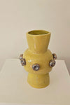 Buttons on Yellow Vase