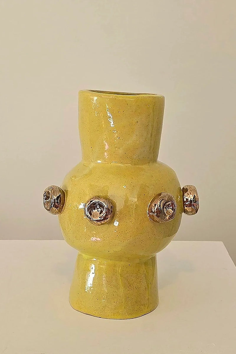Buttons on Yellow Vase